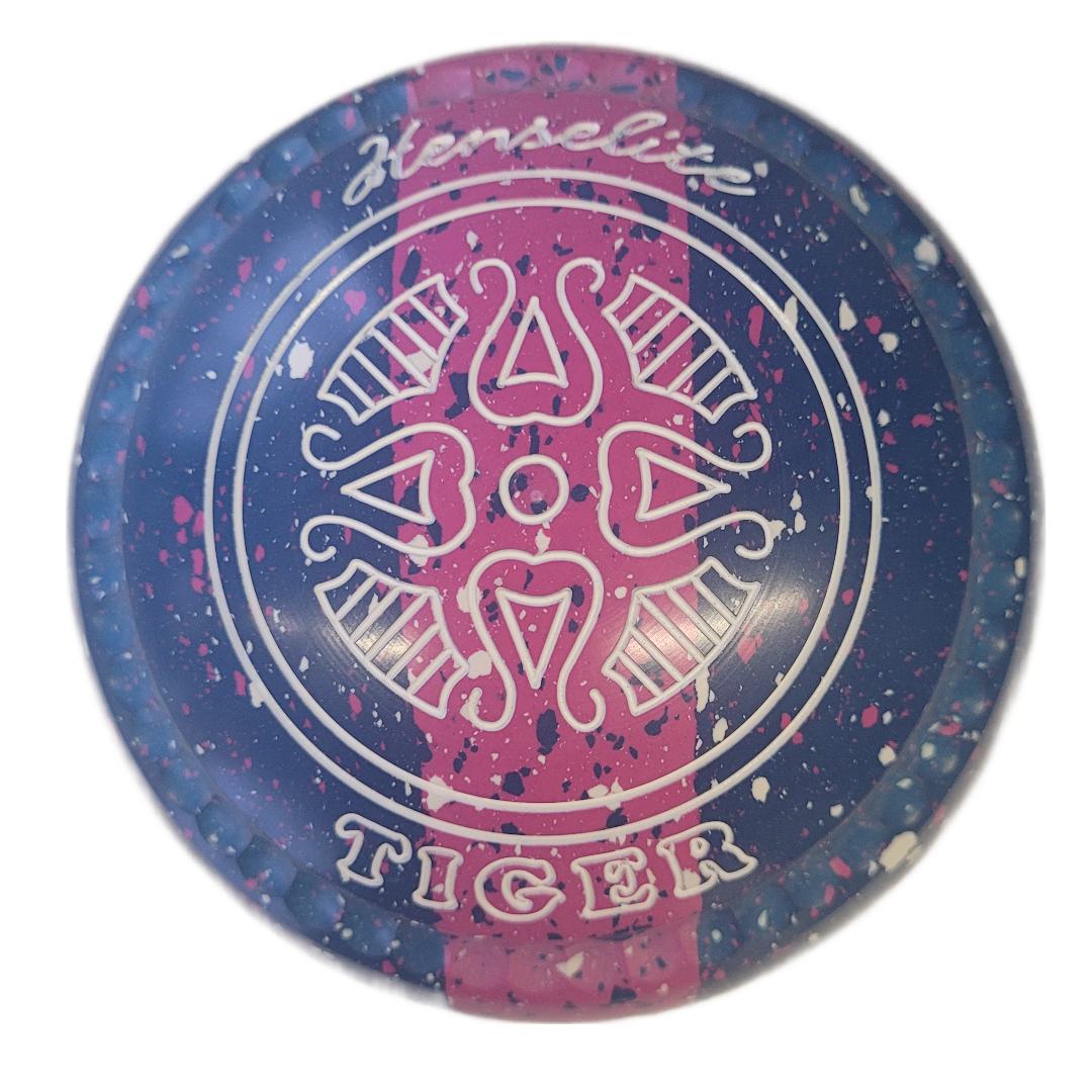 bowl with 'Henselite Tiger' branding on a blue and pink speckled background